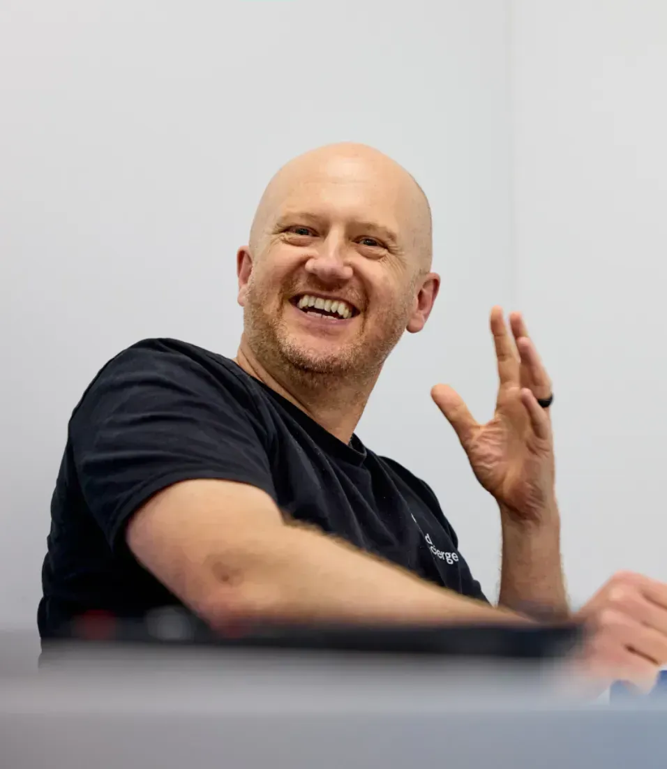 A colleague at Build Concierge gesturing with his hands